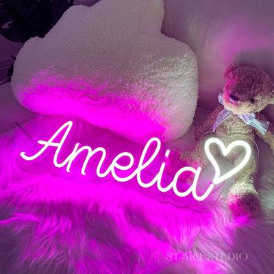 Amelia Name Neon sign by Neon.Outshine - adding a warm, elegant touch to a contemporary bedroom wall.