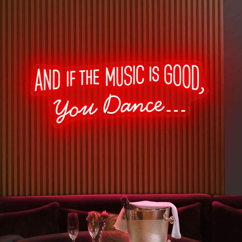 And If the Music Is Good, You Dance neon sign glowing in LED light, mounted on clear acrylic – vibrant music-inspired decor by Neon.Outshine.