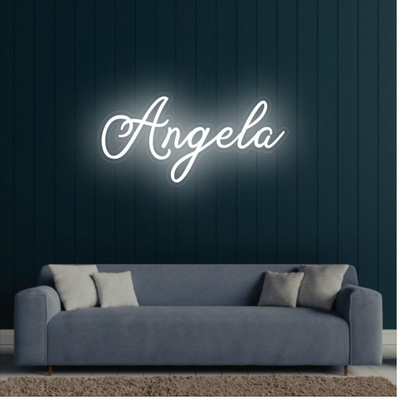 Angela Name Neon sign by Neon.Outshine  - in glowing cursive, mounted on clear acrylic and illuminating a chic, modern space with vibrant light.