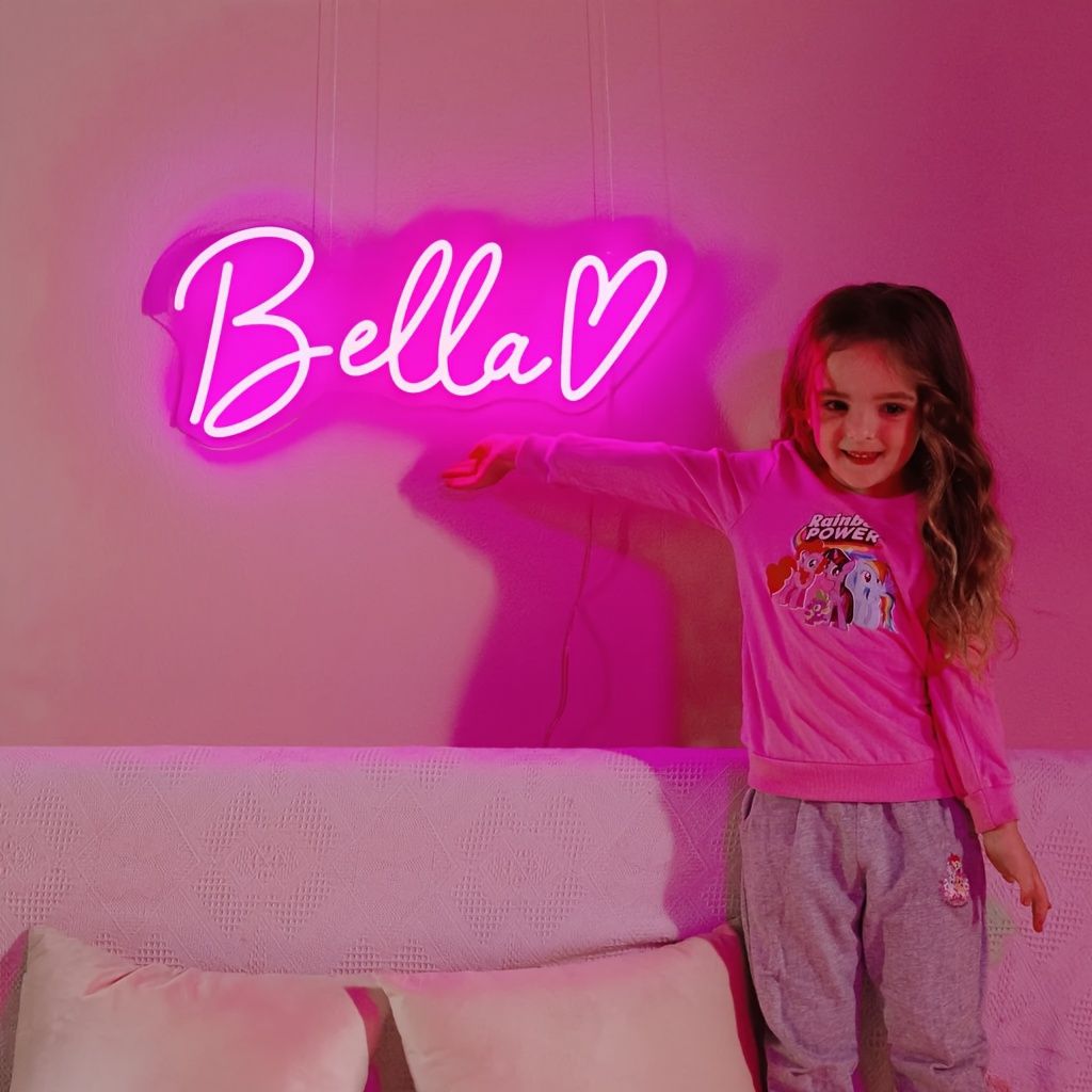 Bella Name Neon sign by Neon.Outshine - perfect for adding a pop of color to any room.