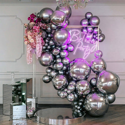 Birthday Party Neon Sign by Neon.Outshine glowing in bright neon color with festive lettering for party decor.