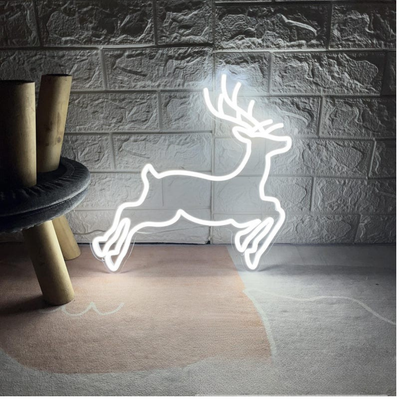 Christmas Deer Neon Sign by Neon.Outshine – glowing LED neon light featuring a graceful deer silhouette for festive holiday décor.