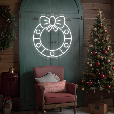 Christmas Wreath Neon Sign by Neon.Outshine glowing in festive colors for holiday décor.
