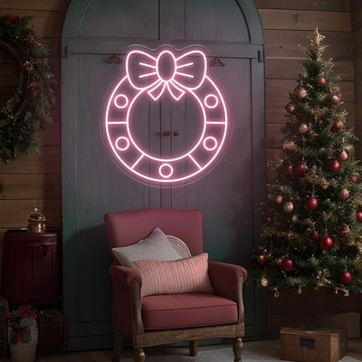 Christmas Wreath Neon Sign by Neon.Outshine glowing in festive colors for holiday décor.
