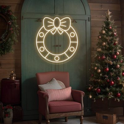 Christmas Wreath Neon Sign by Neon.Outshine glowing in festive colors for holiday décor.
