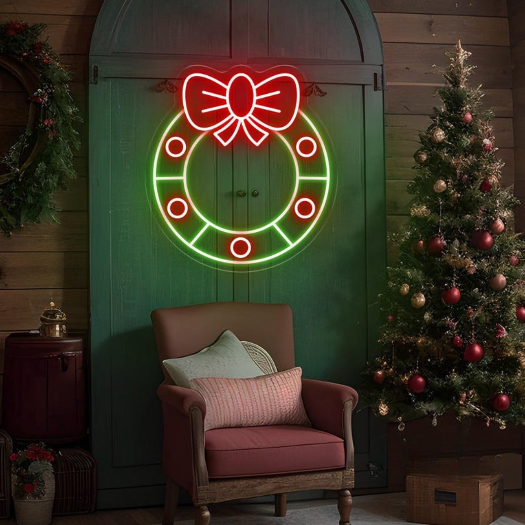 Christmas Wreath Neon Sign by Neon.Outshine glowing in green and red festive colors for holiday décor.