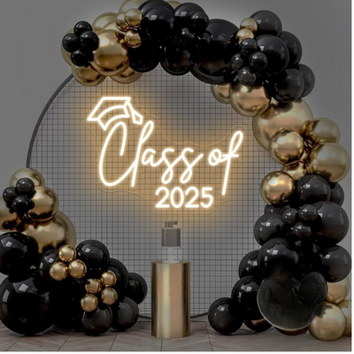 Class of 2025 Neon Sign by Neon.Outshine glowing in vibrant neon with bold graduation-themed lettering.