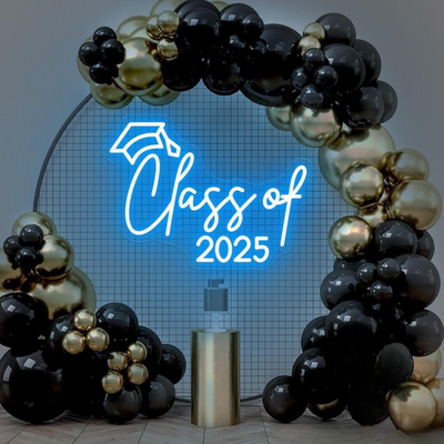 Class of 2025 Neon Sign by Neon.Outshine glowing in vibrant neon with bold graduation-themed lettering.