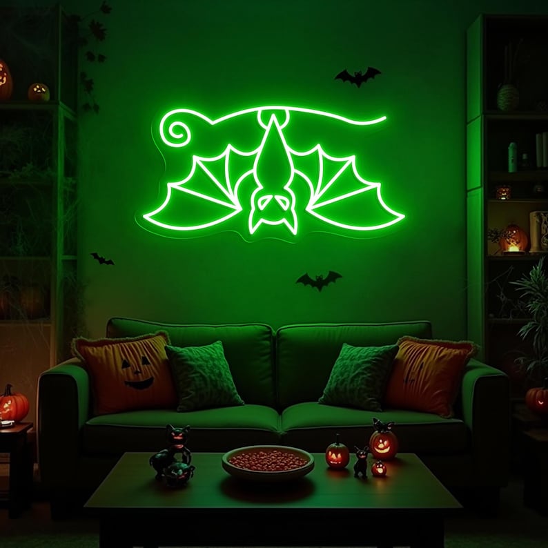 Hanging Bat Halloween Neon Sign glowing in bright LED neon lights by Neon. Outshine