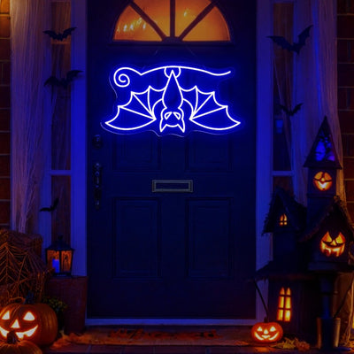 Hanging Bat Halloween Neon Sign glowing in bright LED neon lights by Neon. Outshine