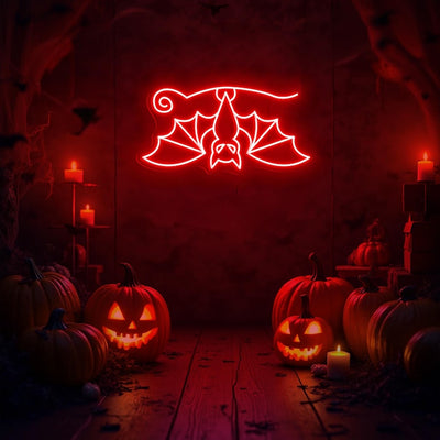 Hanging Bat Halloween Neon Sign glowing in bright LED neon lights by Neon. Outshine