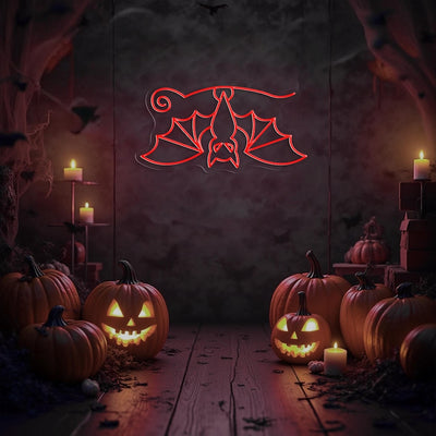 Hanging Bat Halloween Neon Sign glowing in bright LED neon lights by Neon. Outshine