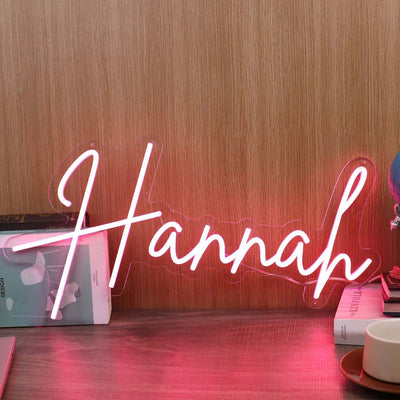 Hannah Name Neon sign  in glowing script, ideal for bedroom decoration, nursery walls, or personalized gift ideas by Neon.Outshine 