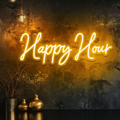 Happy Hour” LED neon sign glowing in bright yellow above a home bar setup — handcrafted by Neon.Outshine for parties and social spaces.