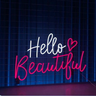 Hello Beautiful Wedding Neon Sign by Neon.Outshine glowing elegantly at a romantic wedding reception backdrop.