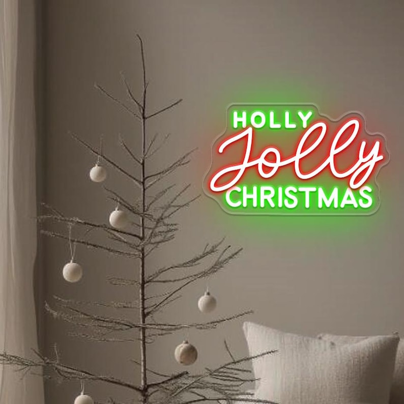 Holly Jolly Christmas Neon Sign by Neon.Outshine glowing in vibrant festive colors for holiday décor.