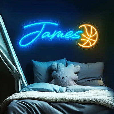 James Name neon sign above a child’s bed in a softly lit nursery - Neon.Outshine 
