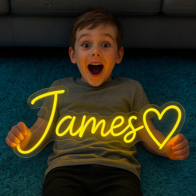 James Name neon sign above a child’s bed in a softly lit nursery - Neon.Outshine 