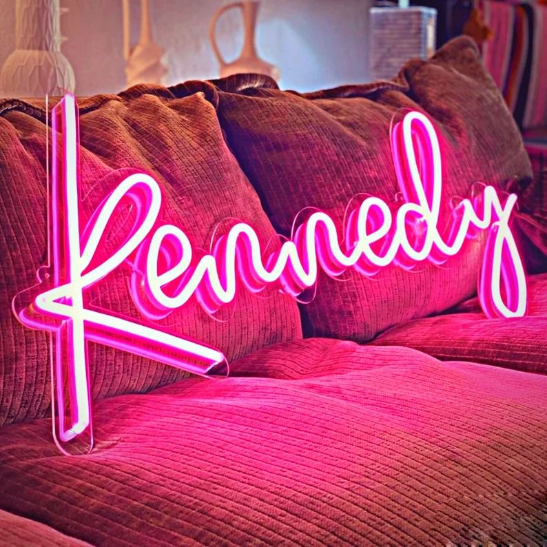 Kennedy" Neon Name Sign by Neon.Outshine -  glowing script font, mounted on clear acrylic
