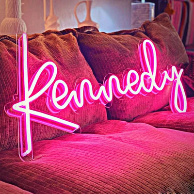 Kennedy" Neon Name Sign by Neon.Outshine -  glowing script font, mounted on clear acrylic