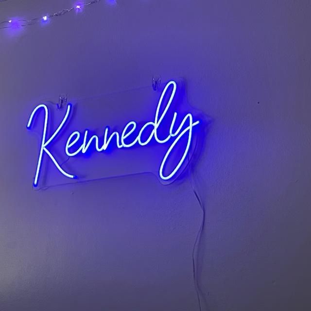 Kennedy" Neon Name Sign by Neon.Outshine -  glowing script font, mounted on clear acrylic