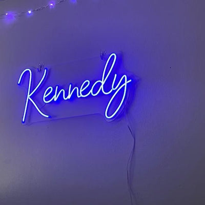 Kennedy" Neon Name Sign by Neon.Outshine -  glowing script font, mounted on clear acrylic