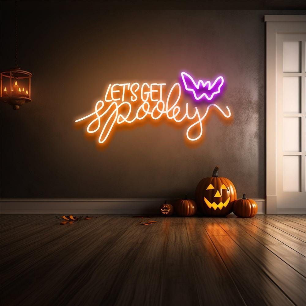 Let’s Get Spooky Halloween Neon Sign glowing in vibrant LED lights, ideal for festive Halloween décor and party backdrops by Neon.Outshine