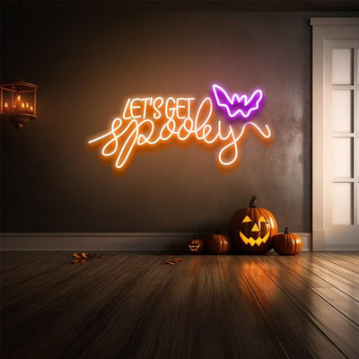 Let’s Get Spooky Halloween Neon Sign glowing in vibrant LED lights, ideal for festive Halloween décor and party backdrops by Neon.Outshine
