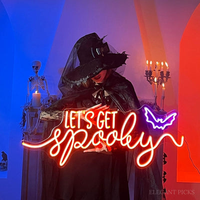 Let’s Get Spooky Halloween Neon Sign glowing in vibrant LED lights, ideal for festive Halloween décor and party backdrops by Neon.Outshine