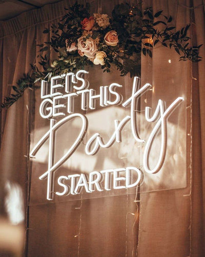 Let’s Get This Party Started Neon sign in glowing LED, mounted on clear acrylic – high-energy party decor by Neon.Outshine.