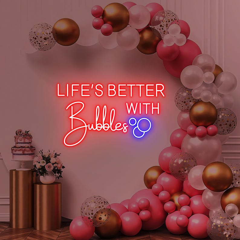 Life is Better with Bubbles Neon Sign by Neon.Outshine in glowing cursive script with optional bubble or champagne glass accents.
