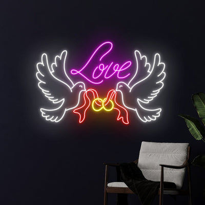 Love Dove Rings Wedding Neon Sign by Neon.Outshine glowing beautifully with doves and interlocking rings at a romantic wedding backdrop.