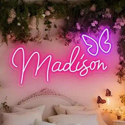 Madison Name Neon sign glowing brightly on a clear acrylic backing - Neon.Outshine 