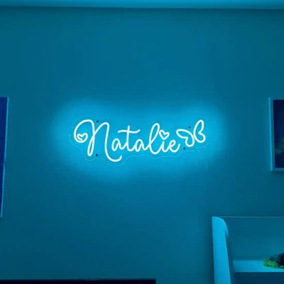 Personalized 'Natalia' name neon sign in lavender, mounted on clear acrylic – Neon.Outshine