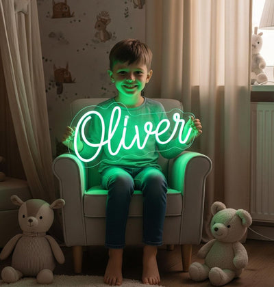  Oliver Name Neon sign by Neon.Outshine. - in vibrant glowing letters, mounted on a clear acrylic sheet and illuminating a cozy modern interior.