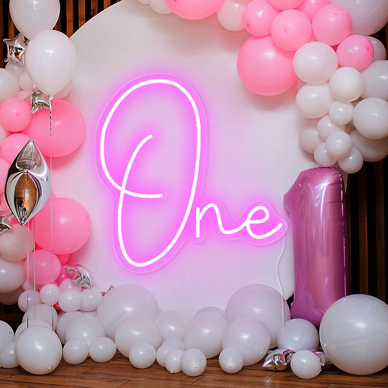 One Neon sign glowing in LED light, mounted on clear acrylic – milestone celebration decor by Neon.Outshine.