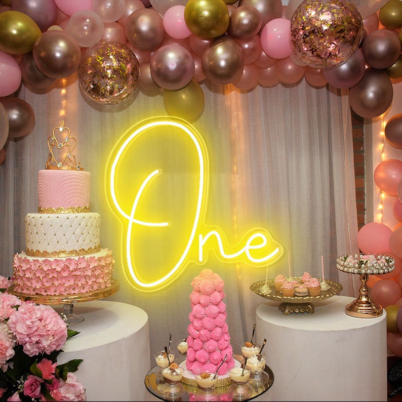 One Neon sign glowing in LED light, mounted on clear acrylic – milestone celebration decor by Neon.Outshine