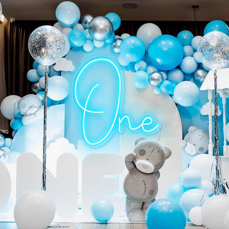 One Neon sign glowing in LED light, mounted on clear acrylic – milestone celebration decor by Neon.Outshine