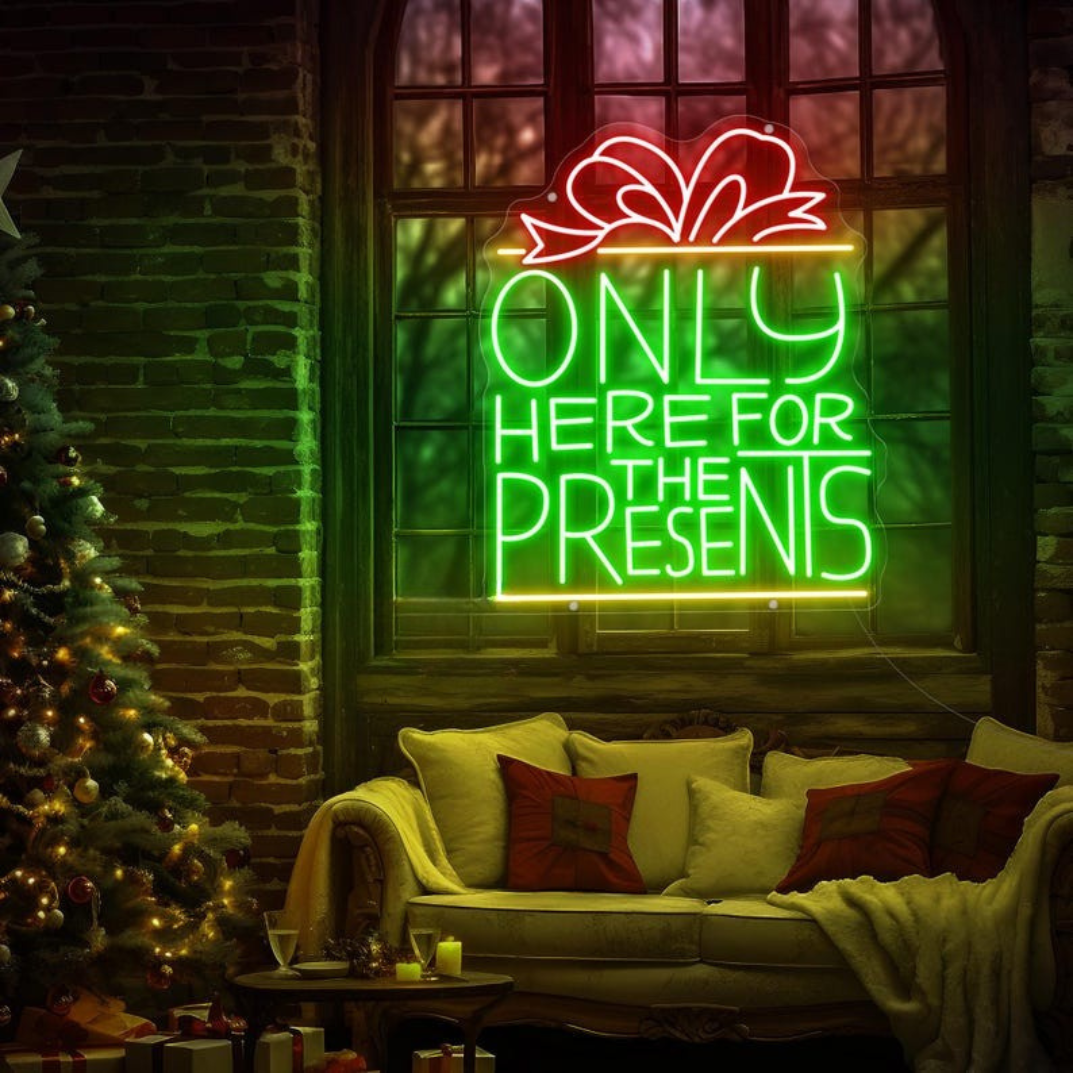 Only Here For The Presents Christmas Neon Sign by Neon.Outshine glowing in festive lights
