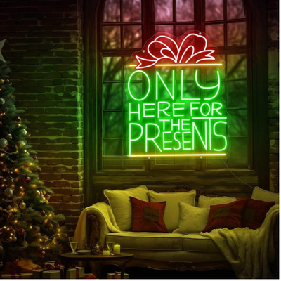 Only Here For The Presents Christmas Neon Sign by Neon.Outshine glowing in festive lights