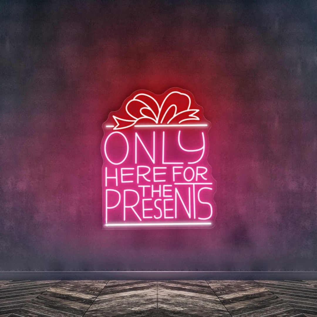Only Here For The Presents Christmas Neon Sign by Neon.Outshine glowing in festive lights