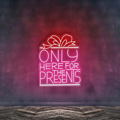 Only Here For The Presents Christmas Neon Sign by Neon.Outshine glowing in festive lights