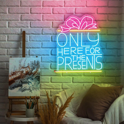Only Here For The Presents Christmas Neon Sign by Neon.Outshine glowing in festive lights