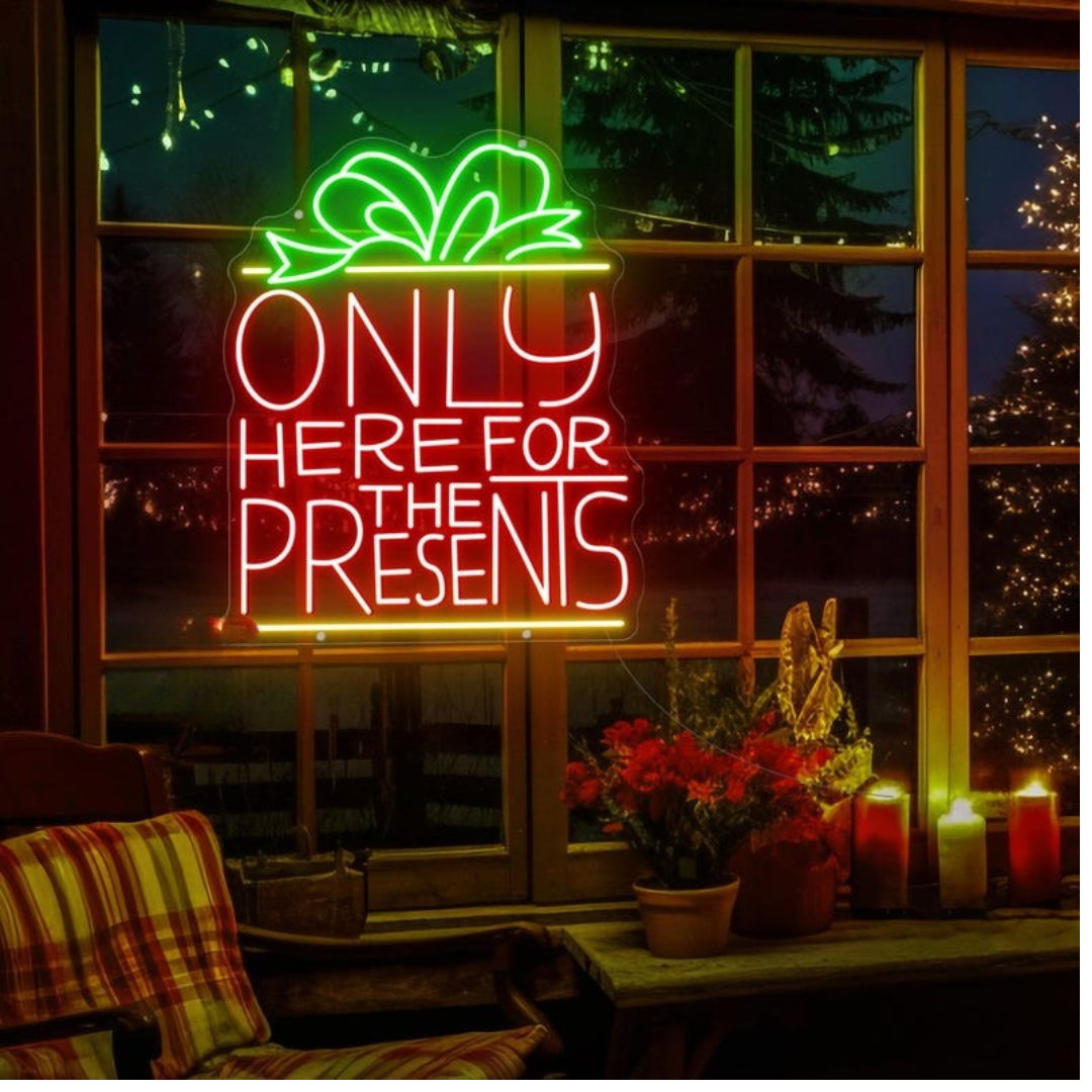 Only Here For The Presents Christmas Neon Sign by Neon.Outshine glowing in festive lights