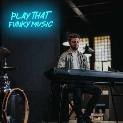 Play That Funky Music LED neon sign glowing in vibrant colors by Neon.Outshine 