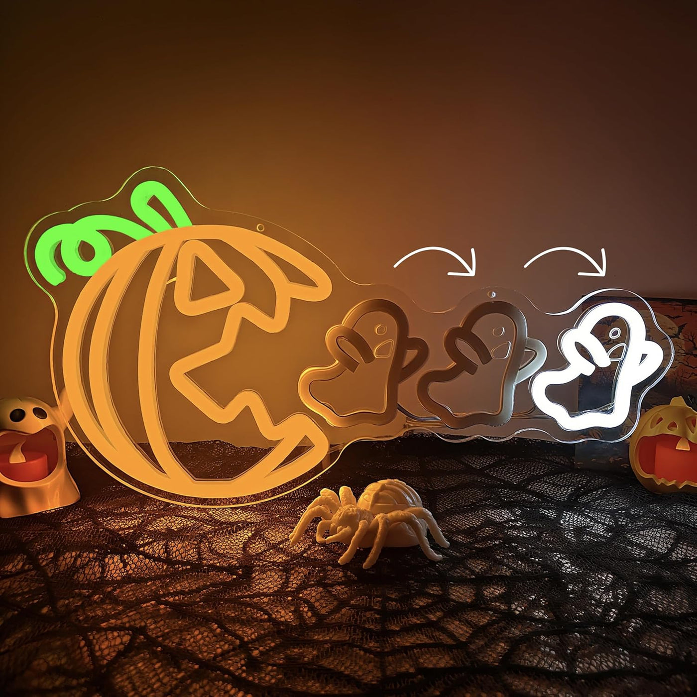 Pumpkin Eat Ghost Halloween Neon Sign by Neon.Outshine glowing LED orange pumpkin with white ghost festive wall décor for parties, bars, and Halloween displays.
