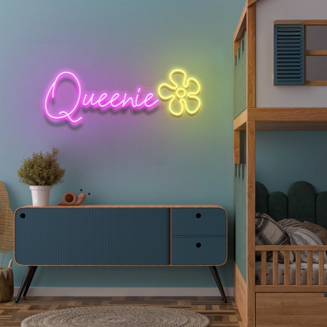 Queenie' neon sign in electric blue, adding a personalized glow to a chic interior – from Neon.Outshine.