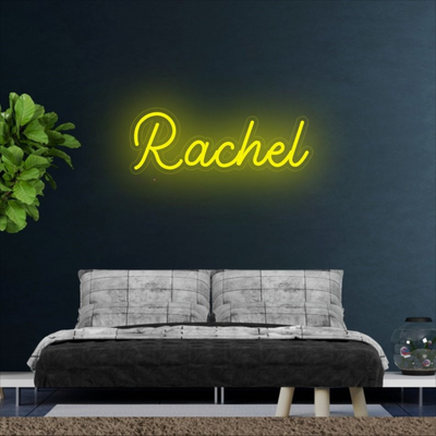 Rachel Name Neon sign in glowing purple script font, mounted on clear acrylic, perfect for modern room or event decor - Neon.Outshine 