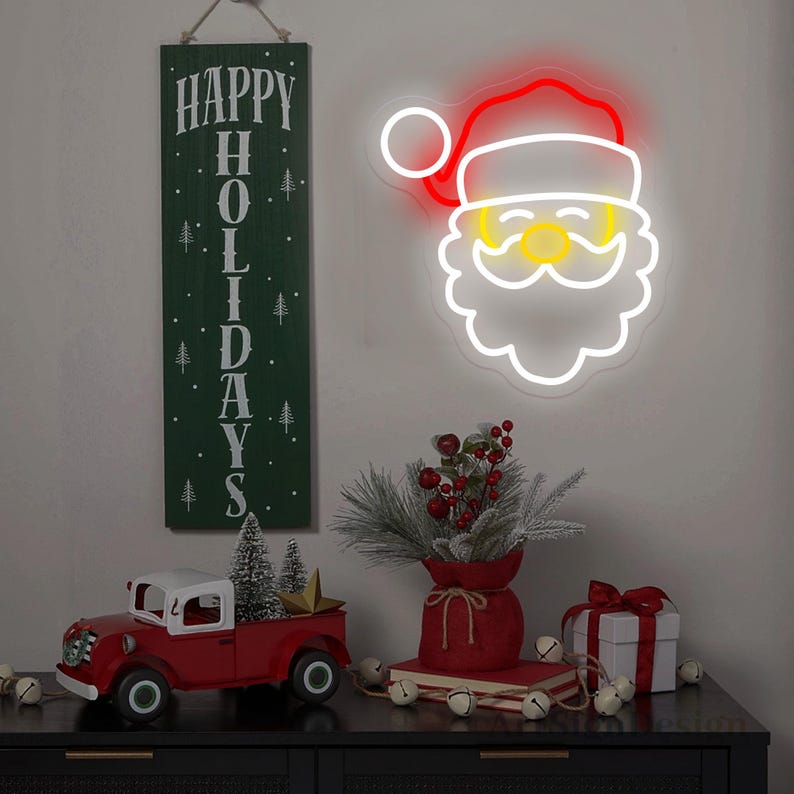 Santa Claus Christmas Neon Sign by Neon.Outshine – vibrant LED neon light featuring Santa’s face with his classic red hat for festive Christmas décor.