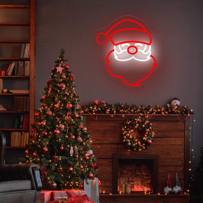Santa Claus Christmas Neon Sign by Neon.Outshine – vibrant LED neon light featuring Santa’s face with his classic red hat for festive Christmas décor.